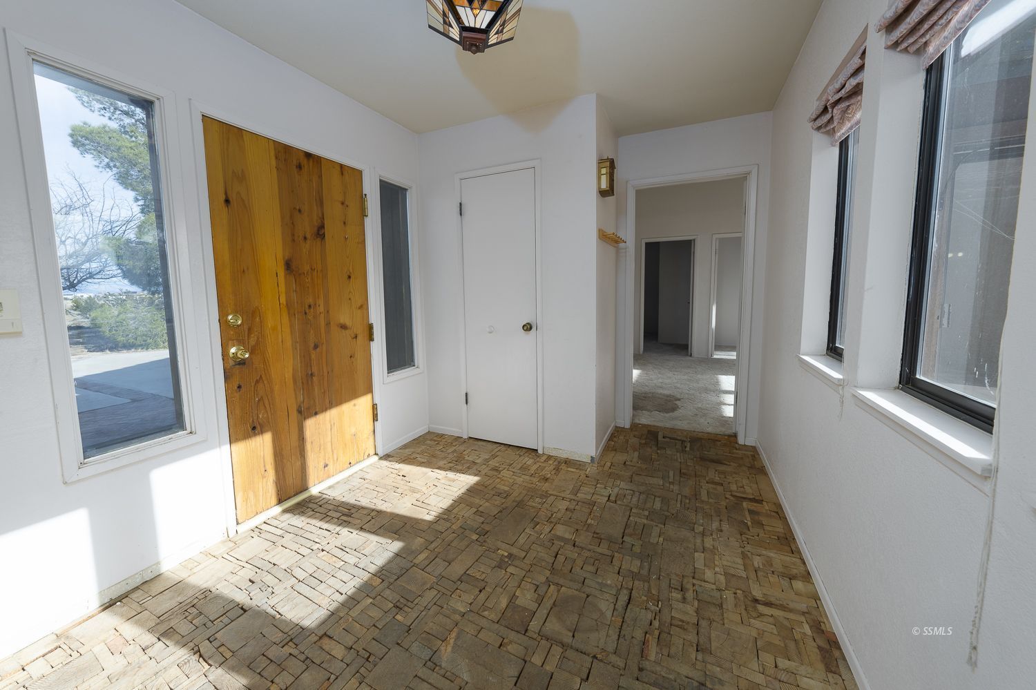 854 Campbell Street Ridgecrest, CA 93555 - Photo 2 of 45 a bedroom with a bed and a mirror