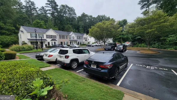 a and car parked in front of a house