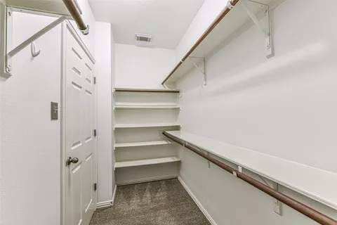 a bath tub sitting next to a shower