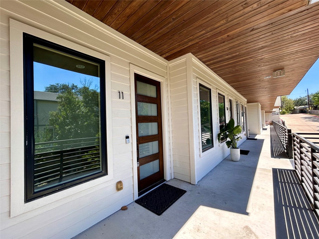 4010 Clawson Road, Unit 11 Austin, TX 78704 - Photo 1 of 19 a view of a patio with table and chairs and potted plants