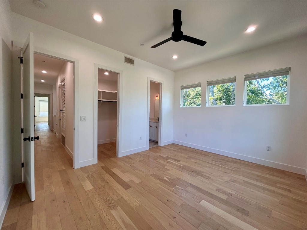 4010 Clawson Road, Unit 11 Austin, TX 78704 - Photo 14 of 19 wooden floor in an empty room with a window