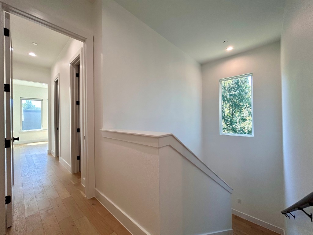 4010 Clawson Road, Unit 11 Austin, TX 78704 - Photo 19 of 19 a view of a hallway with wooden floor and staircase