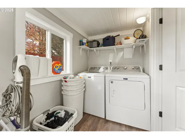 a utility room with dryer and washer