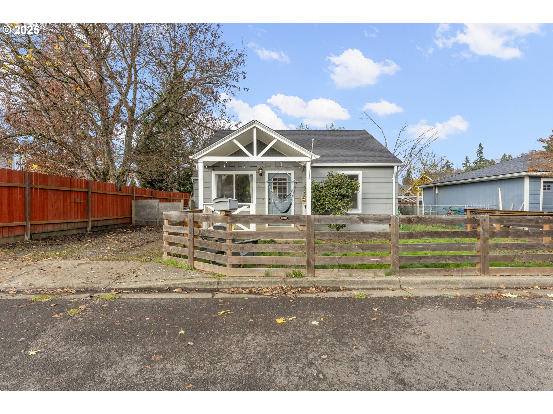 411 Lane Street Silverton, OR 97381 - Photo 13 of 21 a front view of a house with a yard