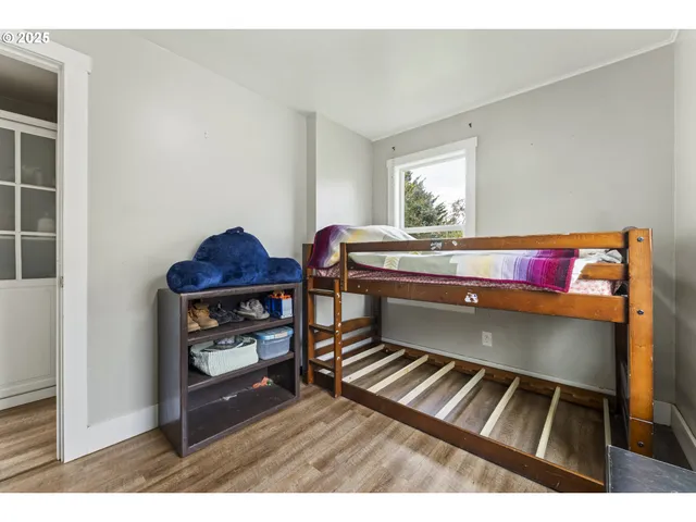 a room with furniture and a window