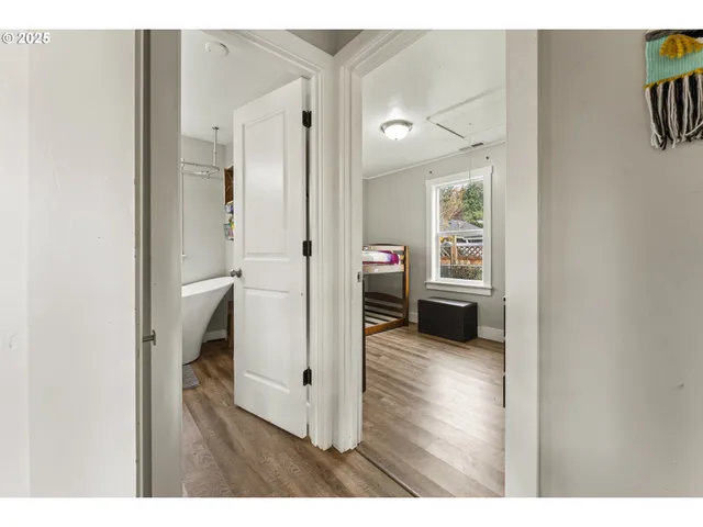 a en suite bathroom with a toilet sink and a mirror