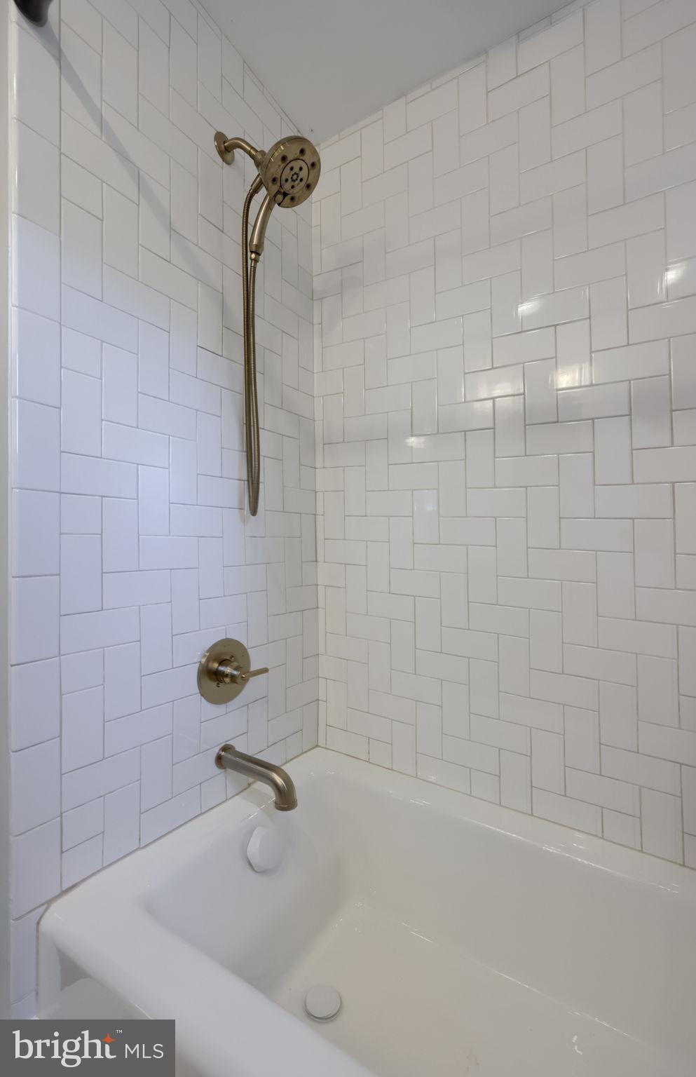 1709 Ridgeview Avenue Lancaster, PA 17603 - Photo 57 of 77 Sleek shower with modern tile design.