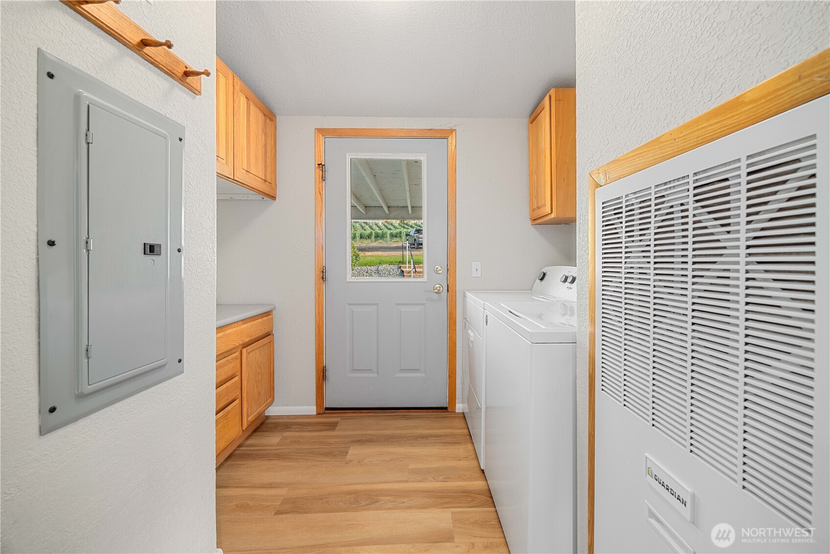 744 Wapato Lake Road Manson, WA 98831 - Photo 16 of 40 a view of utility room with closet and windows
