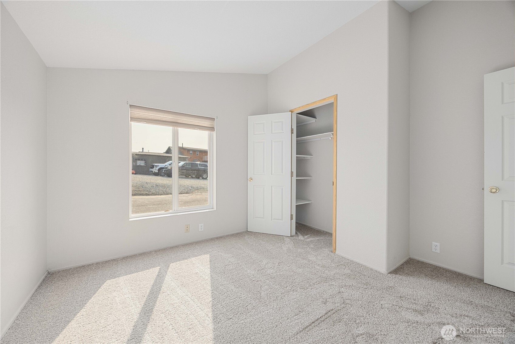 744 Wapato Lake Road Manson, WA 98831 - Photo 17 of 40 an empty room with a window