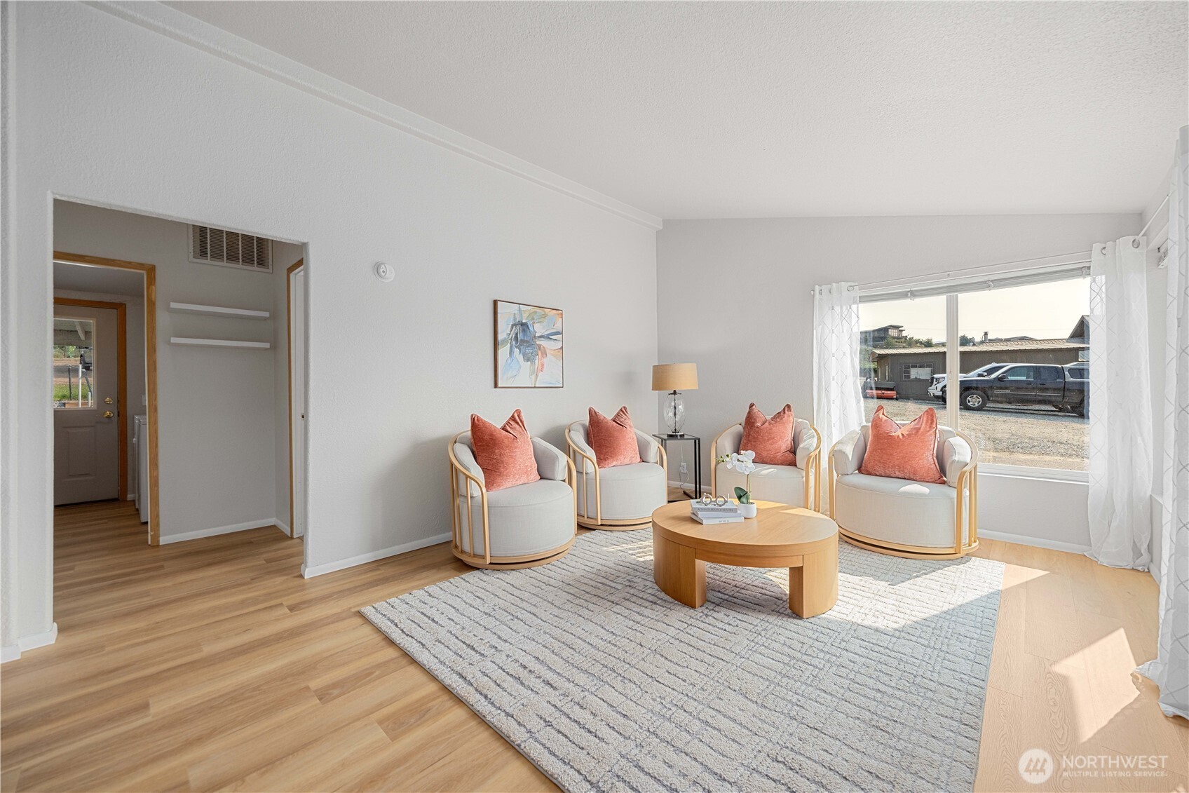 744 Wapato Lake Road Manson, WA 98831 - Photo 20 of 40 a living room with furniture and a wooden floor