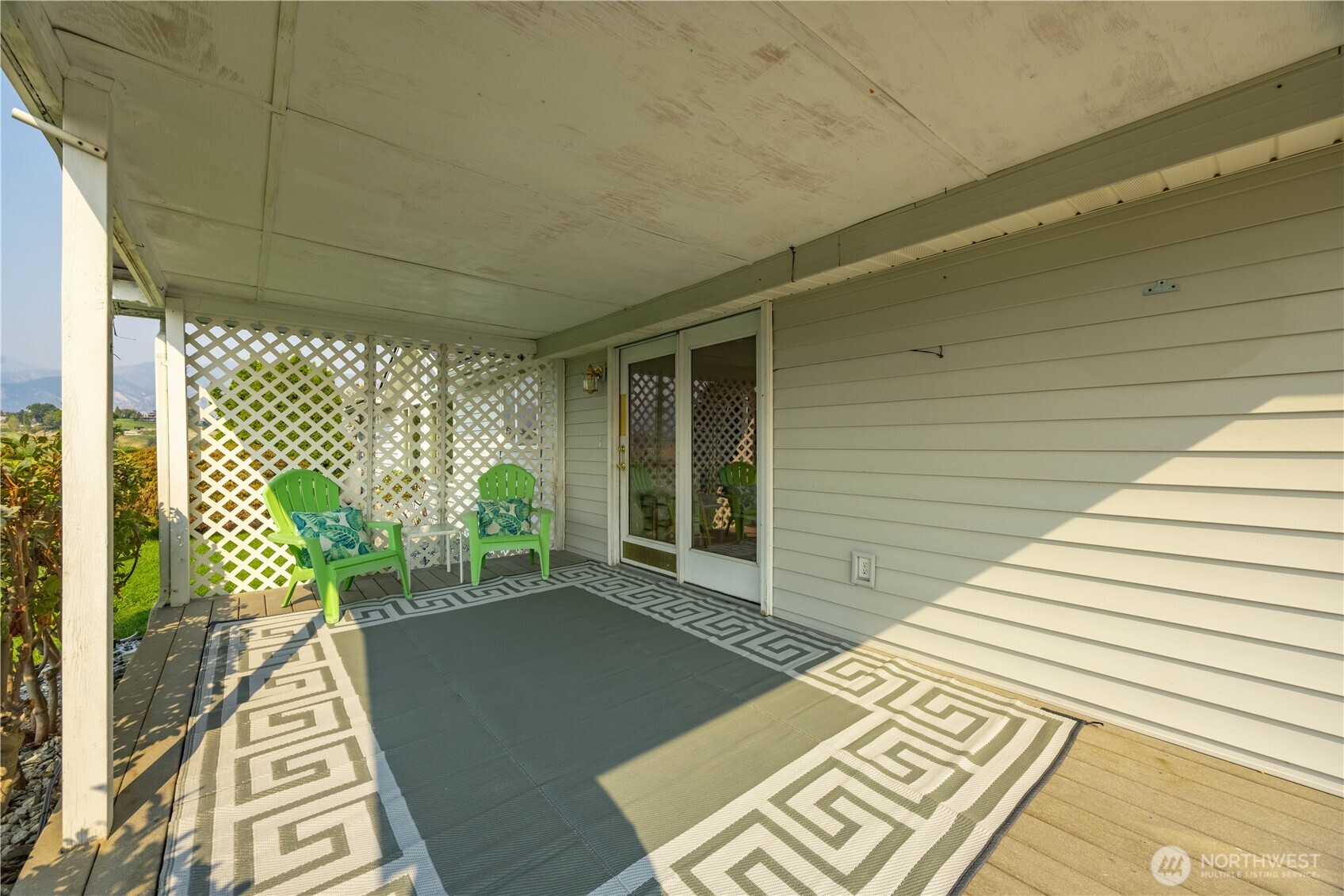744 Wapato Lake Road Manson, WA 98831 - Photo 22 of 40 a view of a two chairs in the balcony
