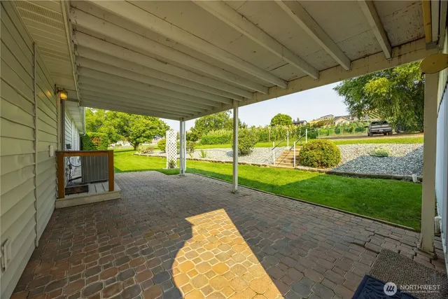 swimming pool with a yard