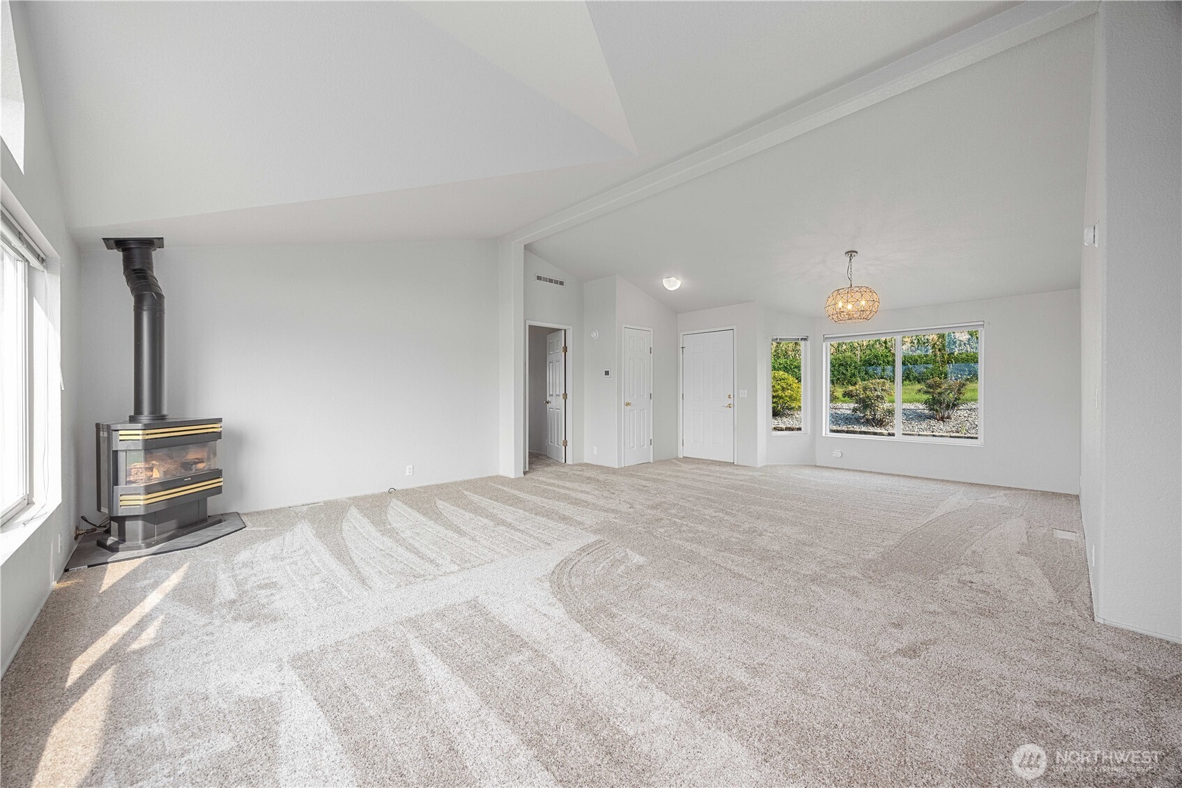 744 Wapato Lake Road Manson, WA 98831 - Photo 4 of 40 a view of empty room with floor to ceiling window