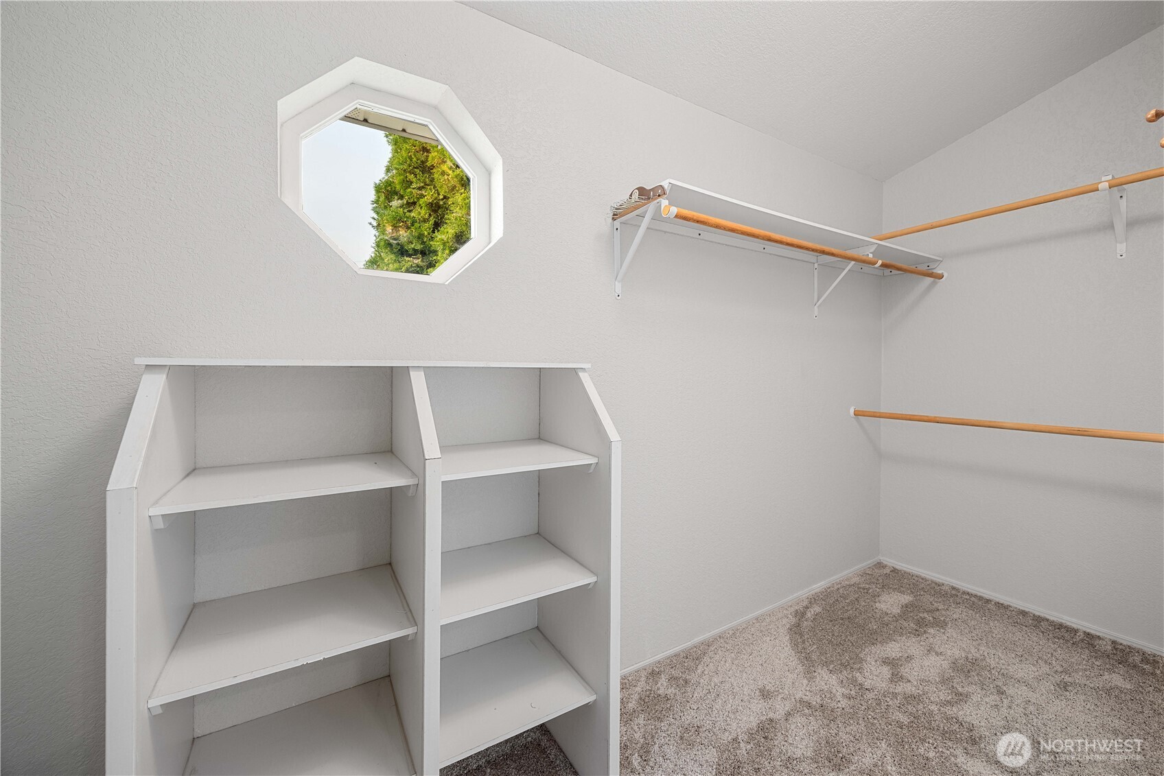 744 Wapato Lake Road Manson, WA 98831 - Photo 7 of 40 a view of walk in closet with empty racks