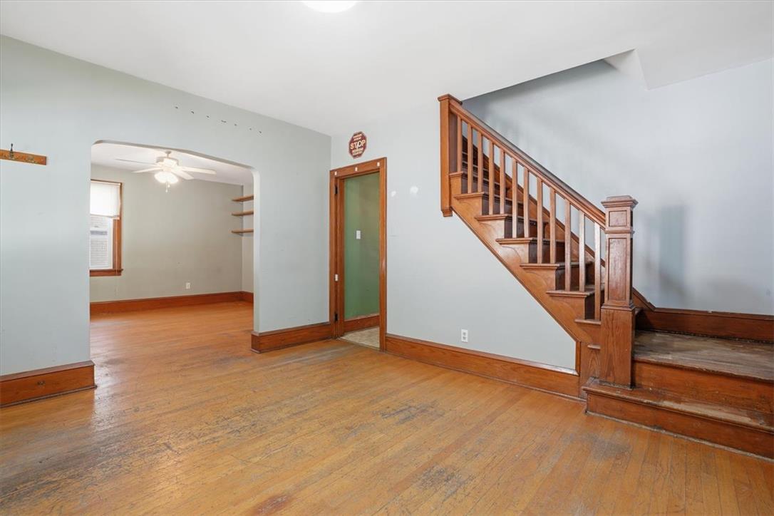 167 Main Road Lehighton, PA 18235 - Photo 3 of 41 Original hardwood floors complement the natural wood staircase, adding timeless character.