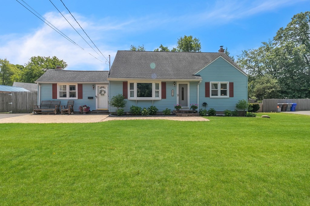 26 Queen Street Enfield, CT 06082 - Photo 1 of 40 a front view of house with yard and green space