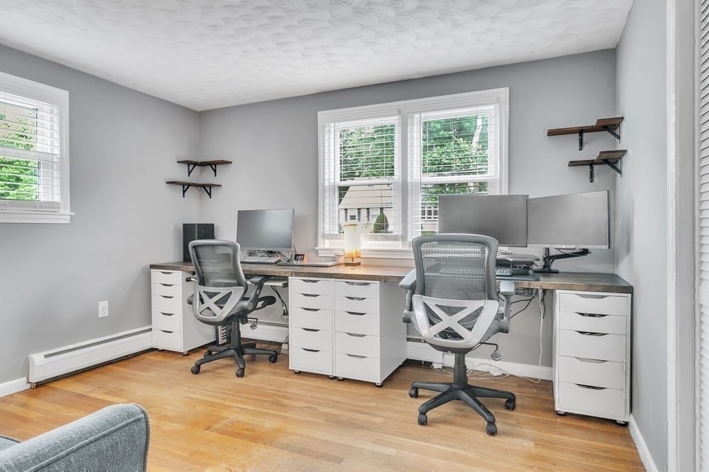 26 Queen Street Enfield, CT 06082 - Photo 17 of 40 a workspace with furniture and a window