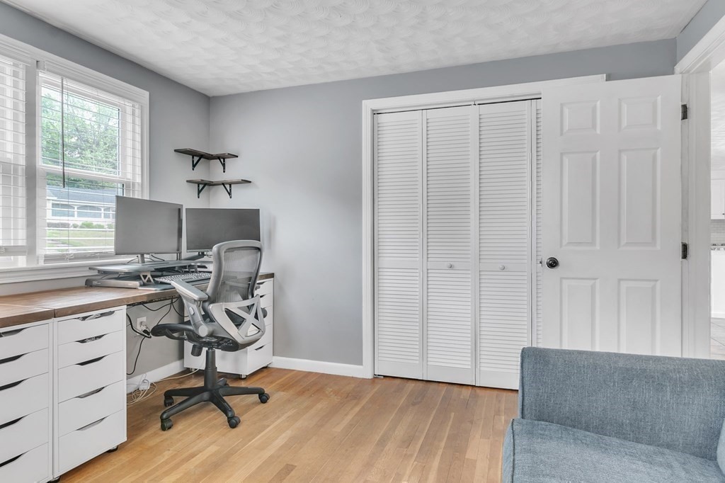 26 Queen Street Enfield, CT 06082 - Photo 18 of 40 a view of a workspace with furniture and a window