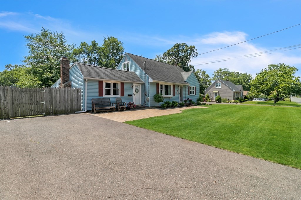 26 Queen Street Enfield, CT 06082 - Photo 2 of 40 front view of a house with a yard
