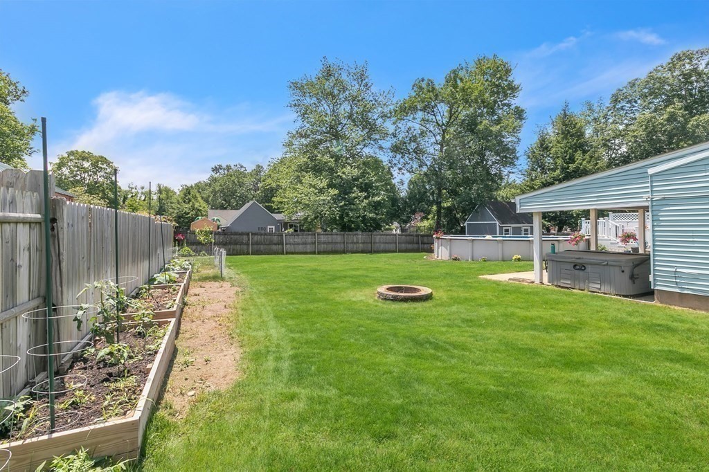 26 Queen Street Enfield, CT 06082 - Photo 36 of 40 a view of a backyard with sitting area