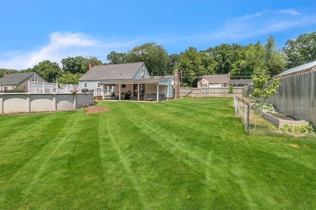 26 Queen Street Enfield, CT 06082 - Photo 37 of 40 a view of a house with a yard porch and sitting area