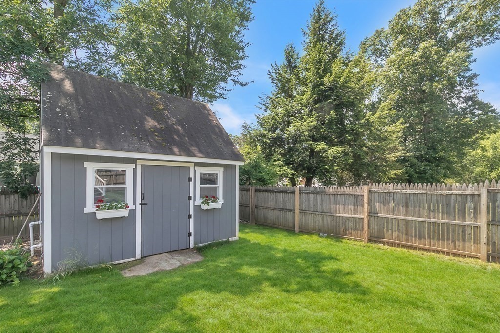 26 Queen Street Enfield, CT 06082 - Photo 38 of 40 a view of a backyard with a garden