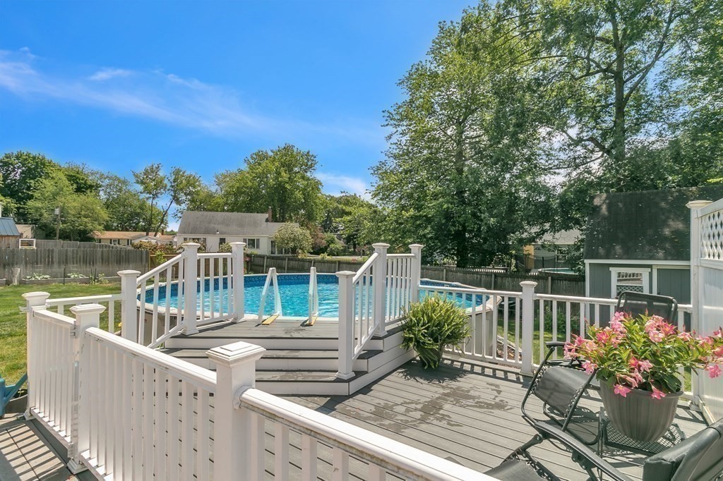 26 Queen Street Enfield, CT 06082 - Photo 40 of 40 a balcony with wooden floor and lake view