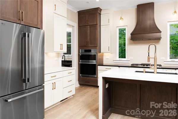 a kitchen with counter top space and sink