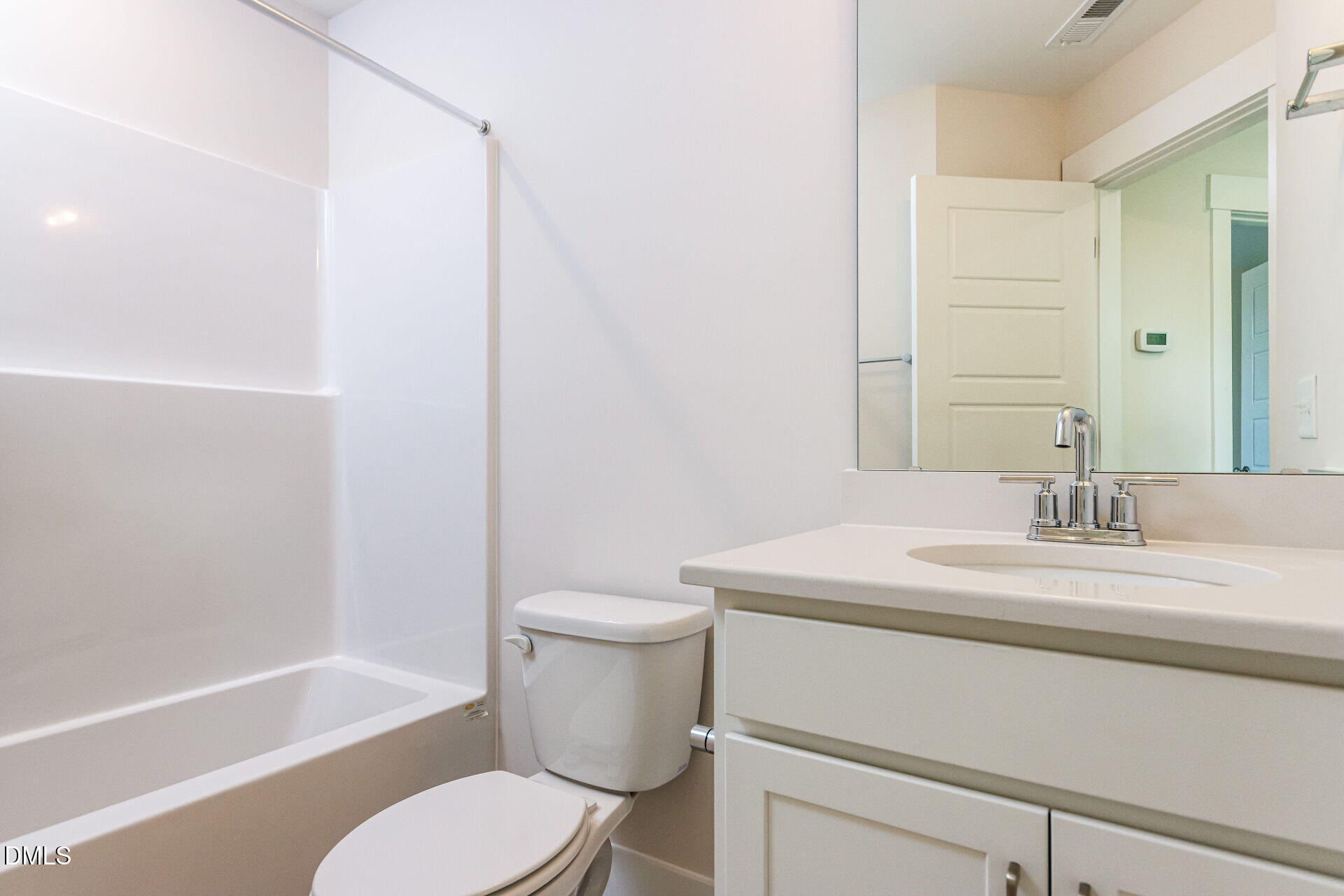 32 Relaxing Way Pittsboro, NC 27312 - Photo 21 of 32 a bathroom with a sink toilet vanity and tub
