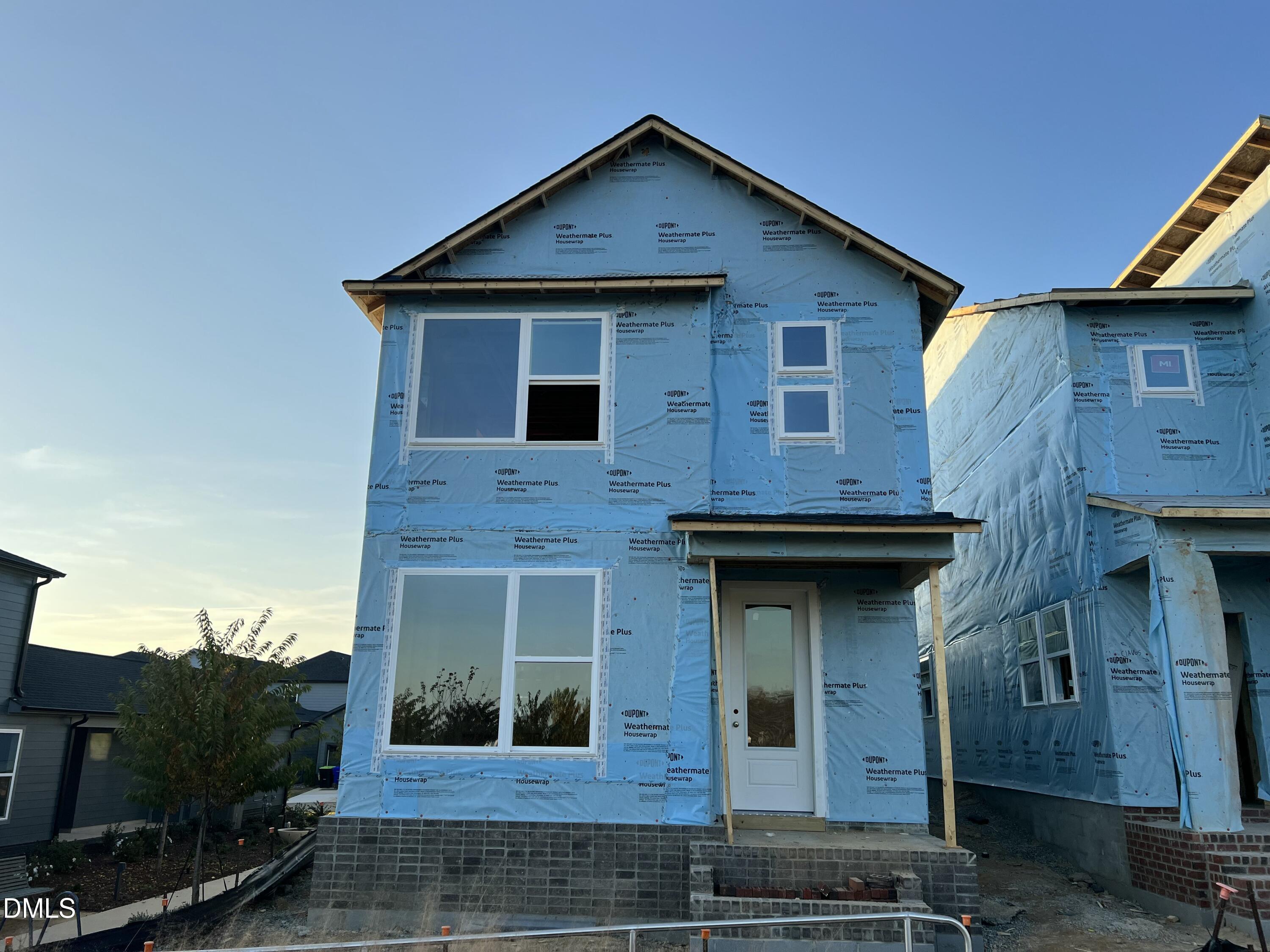 32 Relaxing Way Pittsboro, NC 27312 - Photo 3 of 32 a front view of a house with garden