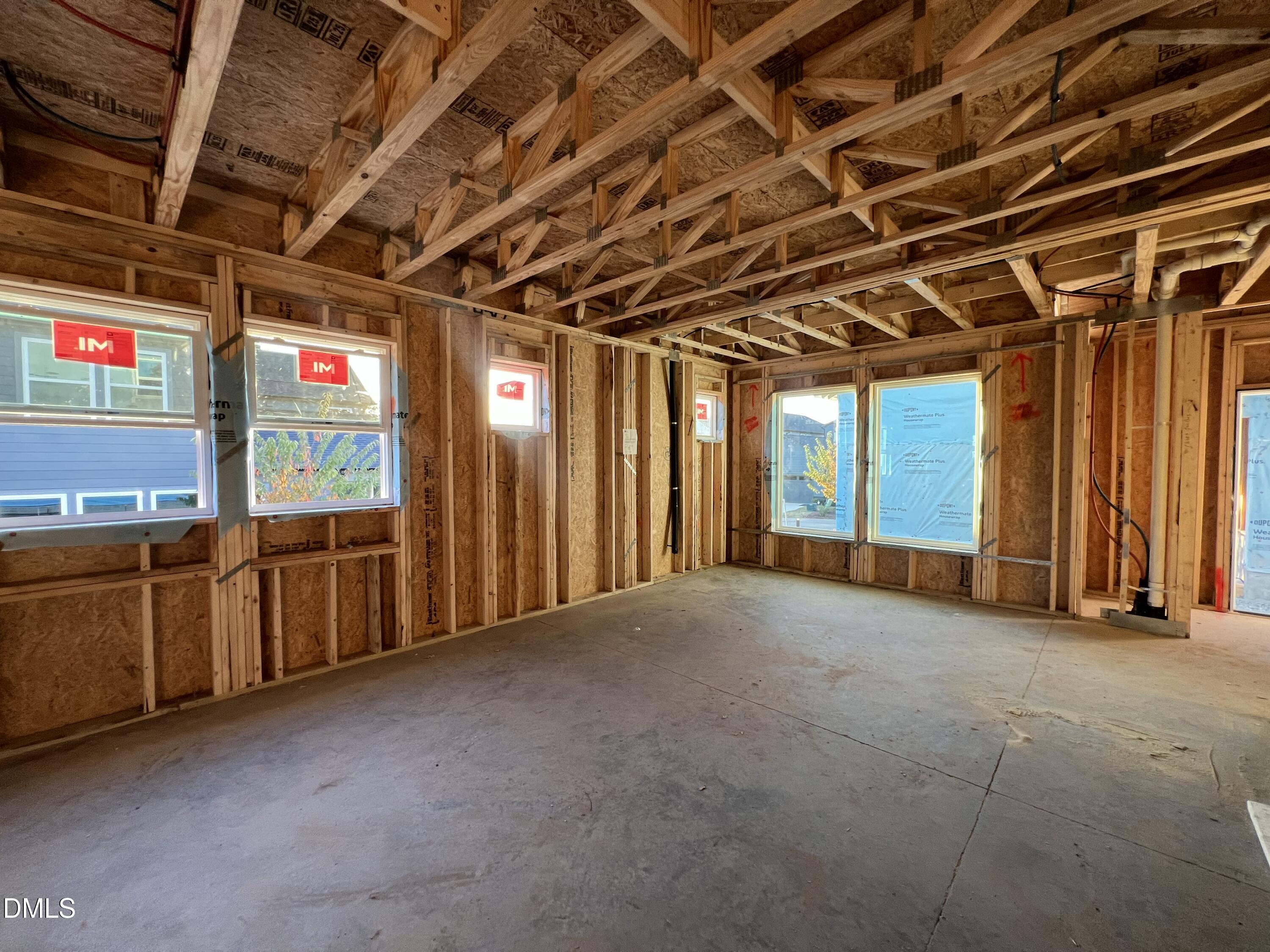 32 Relaxing Way Pittsboro, NC 27312 - Photo 31 of 32 a view of an empty room with furniture and a garage