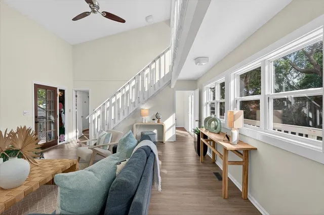 a kitchen with kitchen island a counter top space a sink and stainless steel appliances