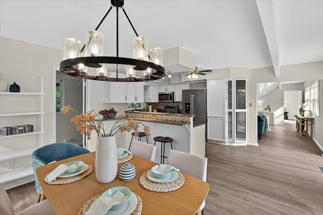 a bed room with a bed and windows