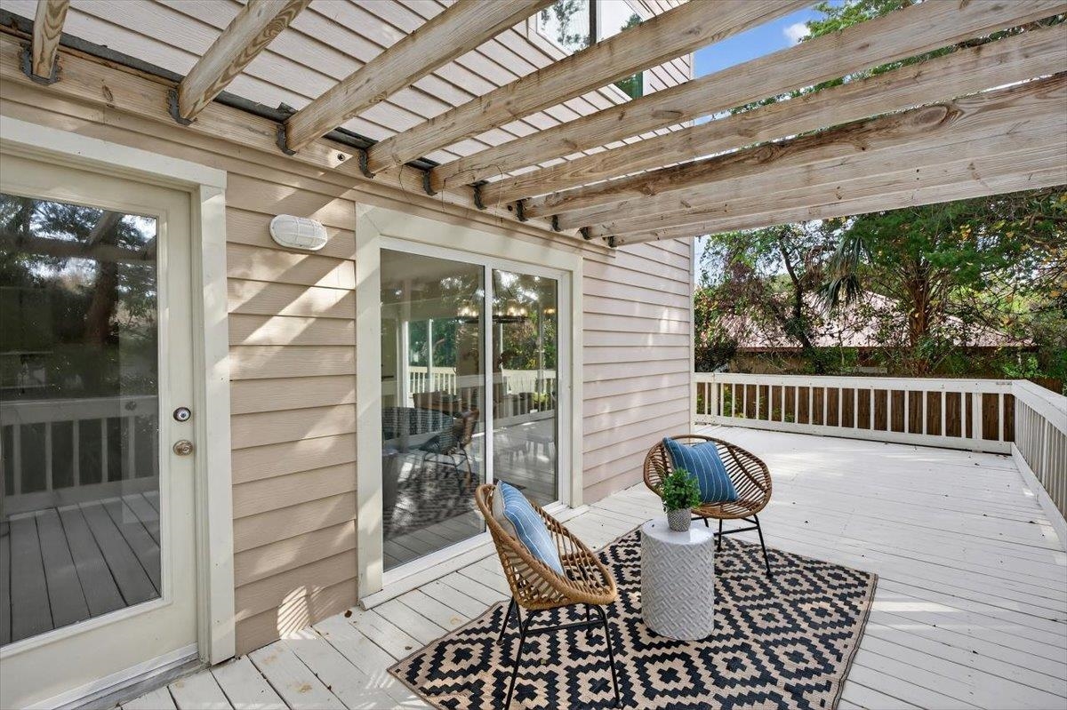 6 Manatee Court St. Augustine, FL 32080 - Photo 25 of 71 a view of balcony with a potted plant and outdoor seating
