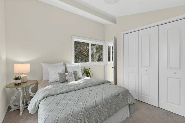 a view of a wooden deck and city view