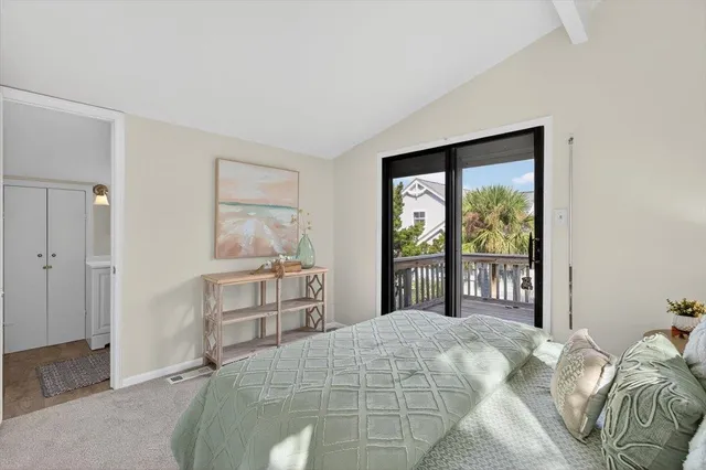 a front view of a house with a iron gate