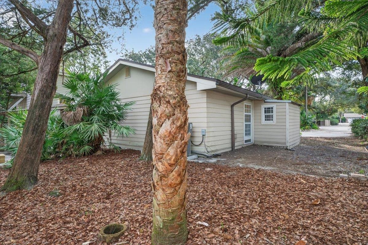 6 Manatee Court St. Augustine, FL 32080 - Photo 46 of 71 a view of a house with a yard and tree