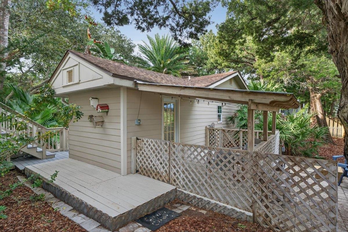 6 Manatee Court St. Augustine, FL 32080 - Photo 50 of 71 a backyard of a house with table and chairs