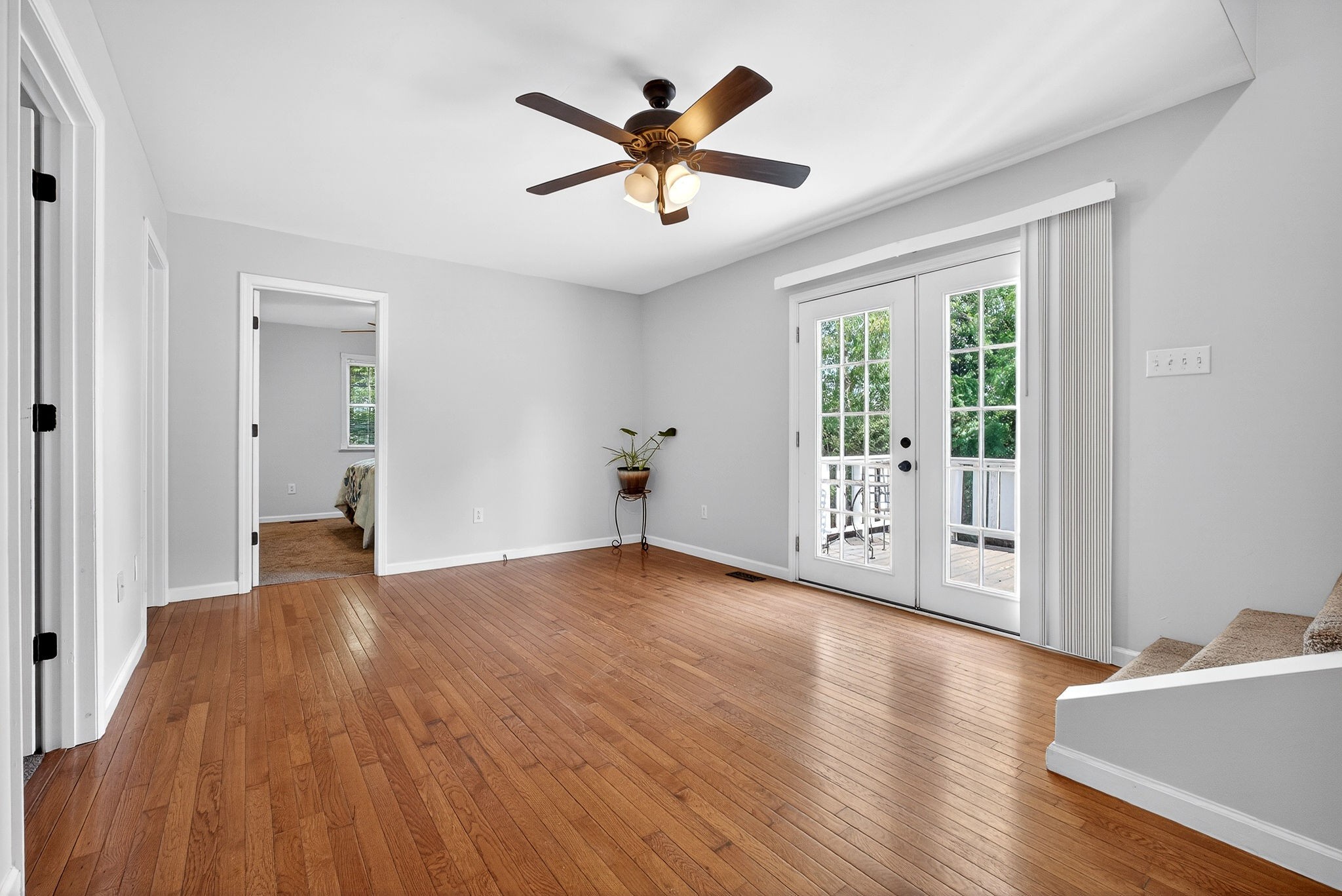 412 Rock Station Road Rock Island, TN 38581 - Photo 13 of 47 a view of empty room with wooden floor and fan