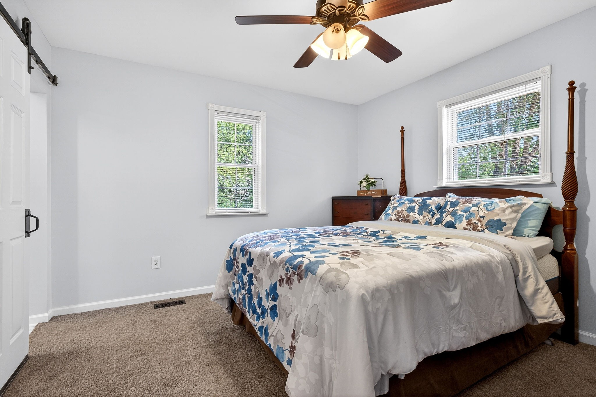 412 Rock Station Road Rock Island, TN 38581 - Photo 16 of 47 a bedroom with a bed and window