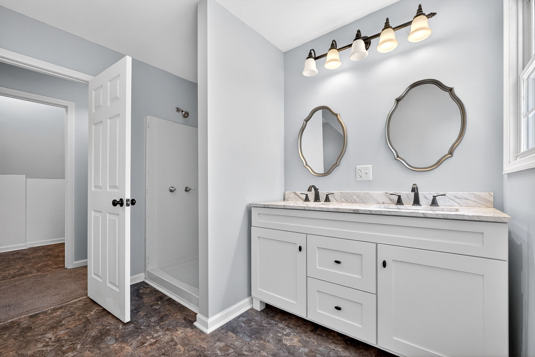 412 Rock Station Road Rock Island, TN 38581 - Photo 29 of 47 a bathroom with a double vanity sink and a mirror