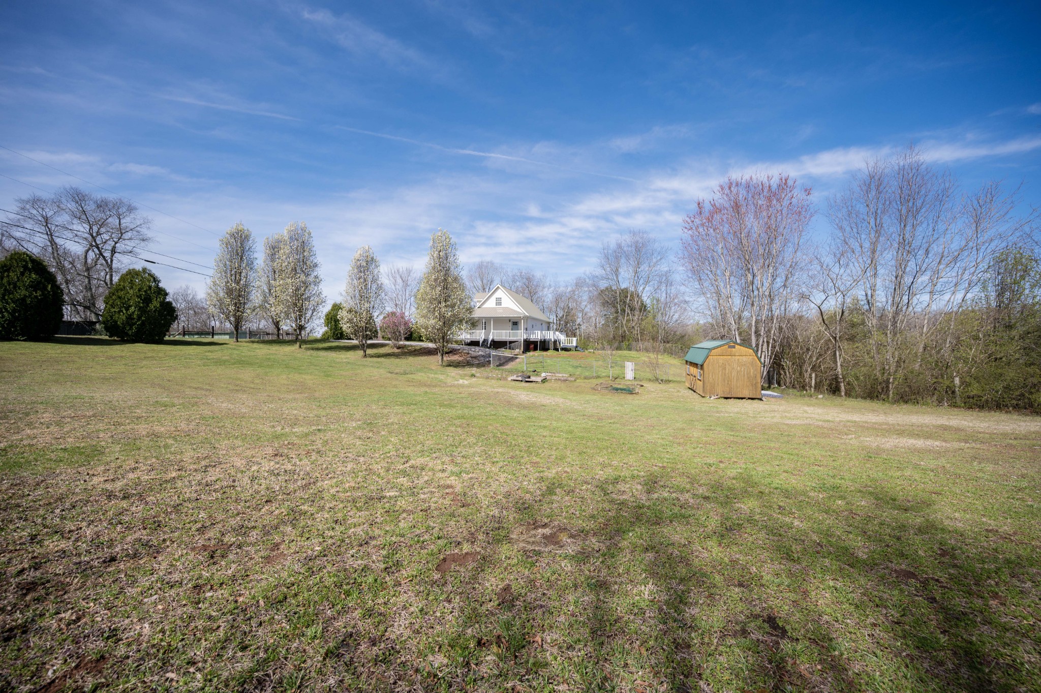 412 Rock Station Road Rock Island, TN 38581 - Photo 46 of 47 a backyard of a house with lots of green space