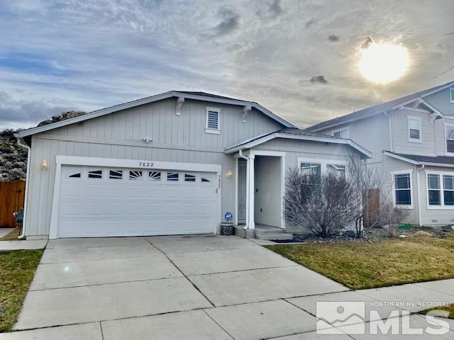 7622 Corso Street Reno, NV 89506 - Photo 1 of 19 a front view of a house with garden