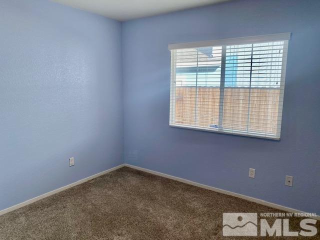7622 Corso Street Reno, NV 89506 - Photo 11 of 19 a view of an empty room with a window
