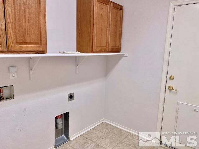 7622 Corso Street Reno, NV 89506 - Photo 13 of 19 a bathroom with a sink and cabinets