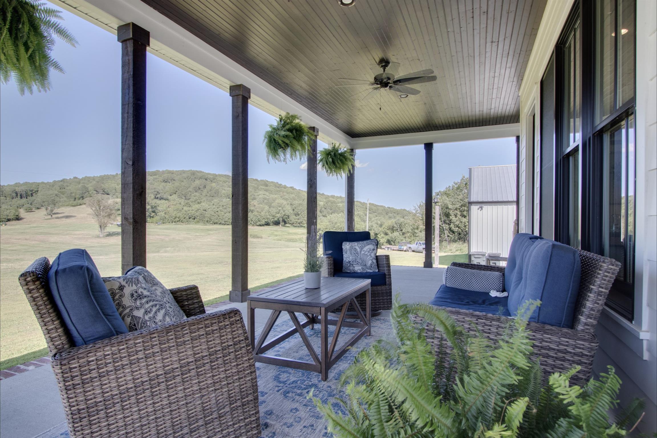 2845 Beech Log Road Watertown, TN 37184 - Photo 25 of 30 a living room with furniture and a large window