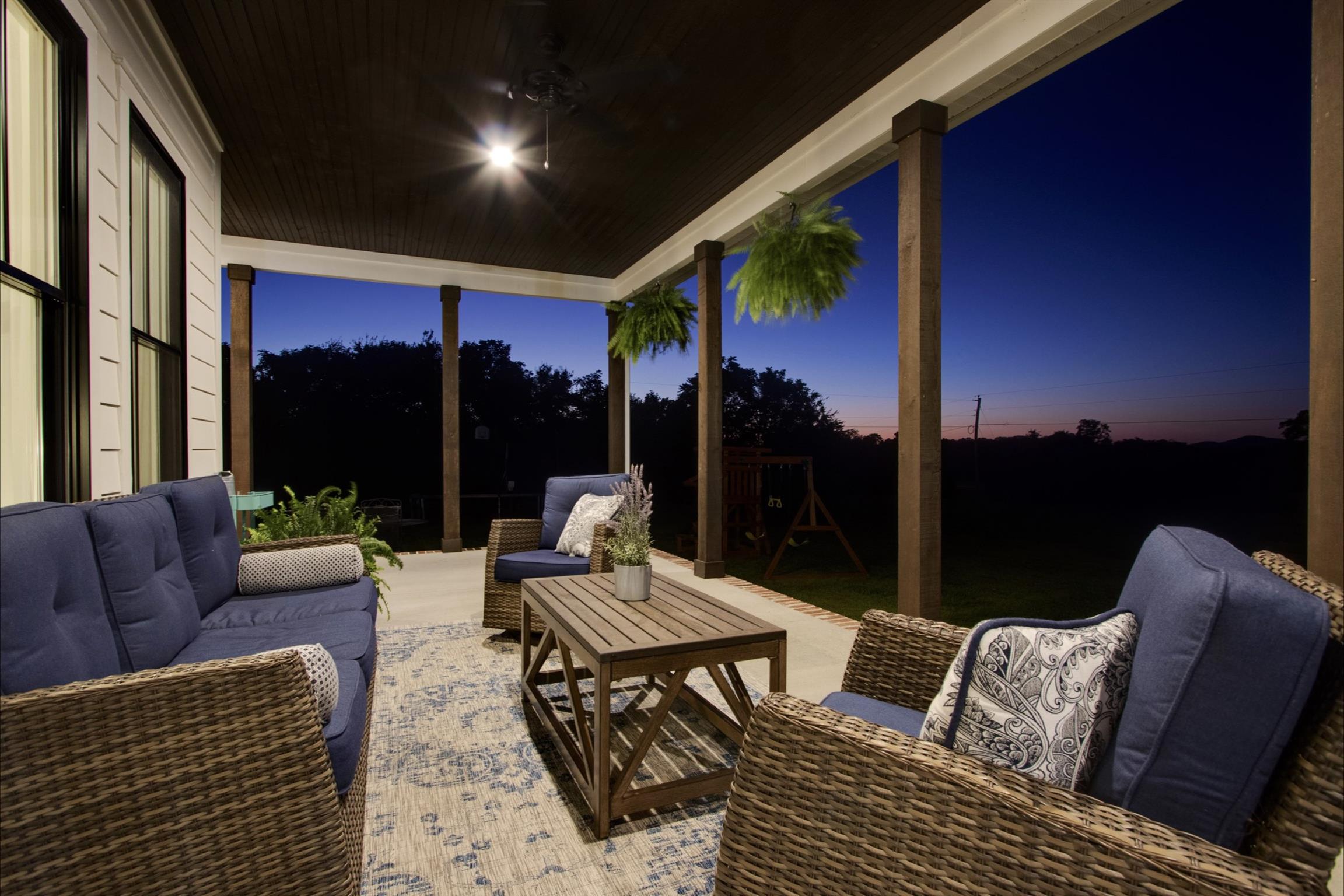 2845 Beech Log Road Watertown, TN 37184 - Photo 27 of 30 a outdoor living space with furniture and a potted plant