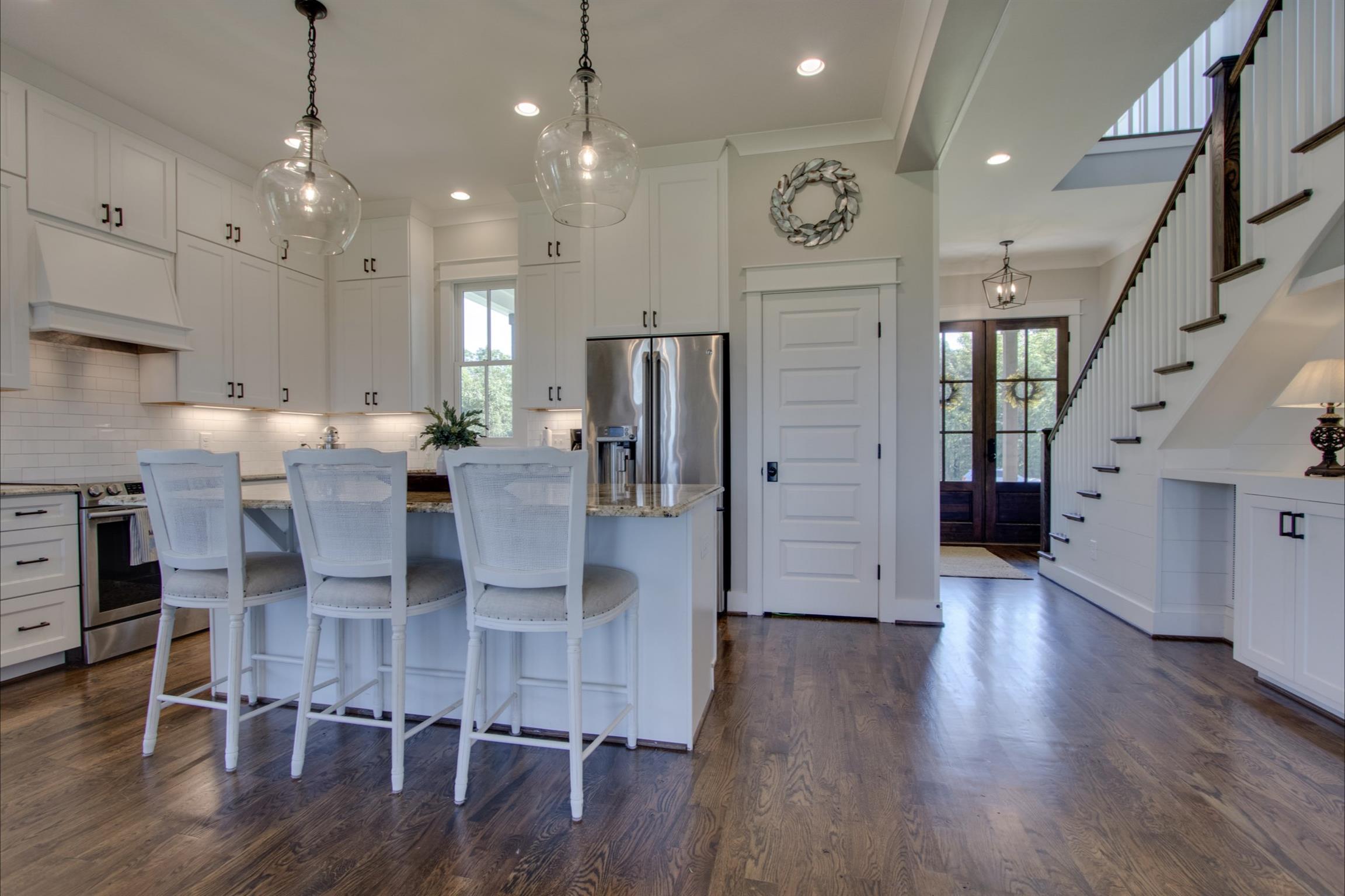 2845 Beech Log Road Watertown, TN 37184 - Photo 8 of 30 a view of a kitchen with cabinets and wooden floor