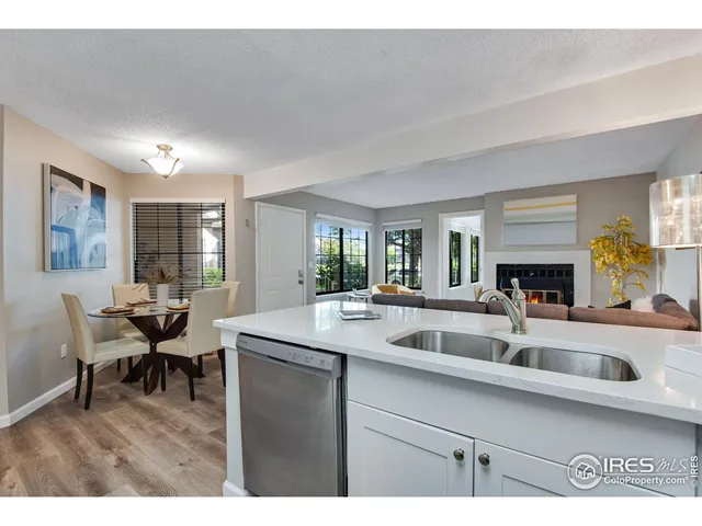a kitchen with a refrigerator stove and microwave