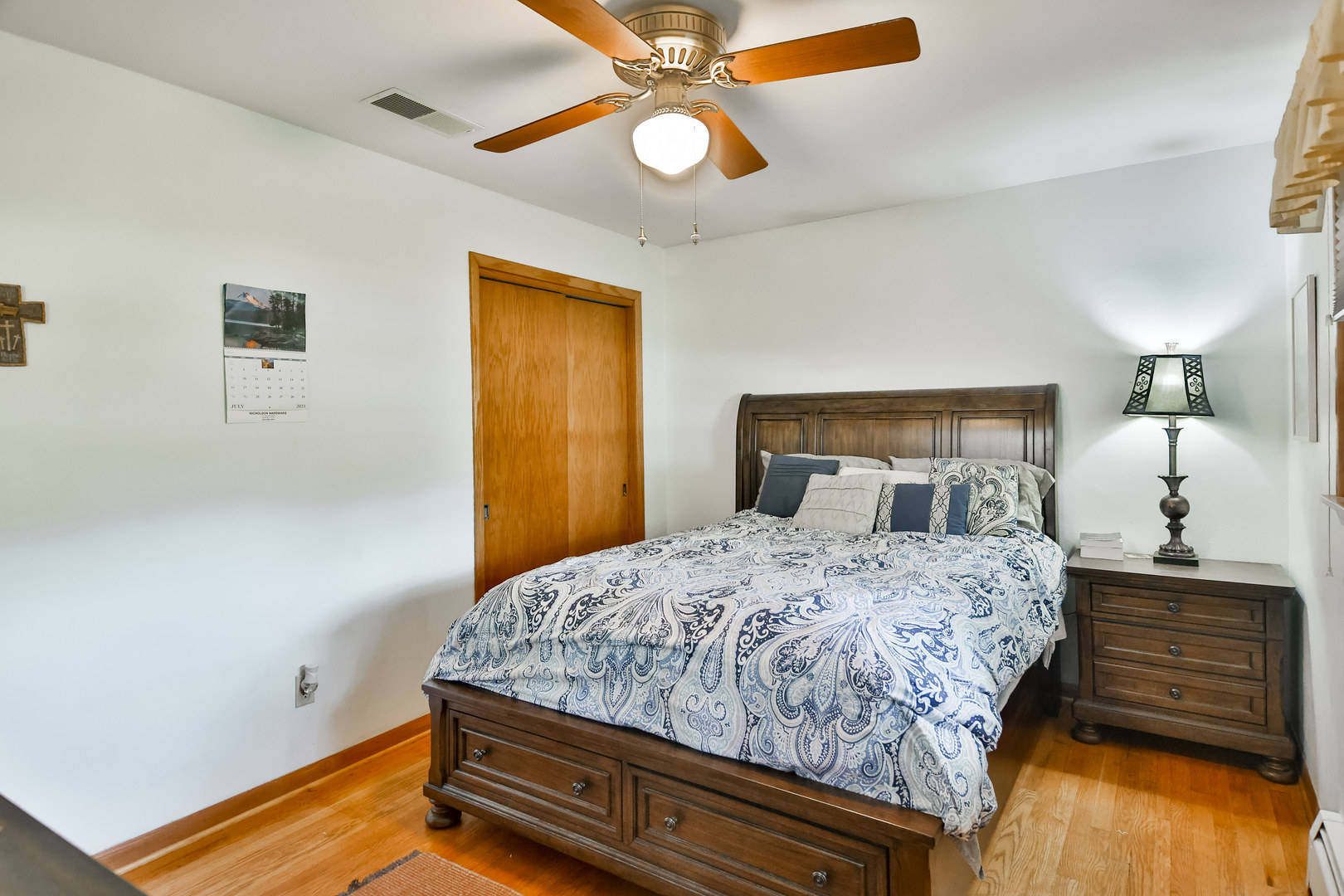 3307 Ruth Street Rockford, IL 61103 - Photo 15 of 28 a bedroom with a bed and a lamp on the dresser